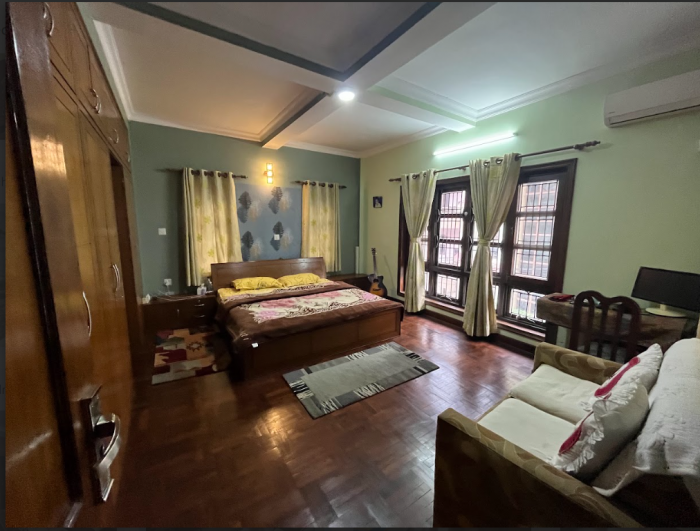 A neoclassical bungalow is on sale at Manamaiju